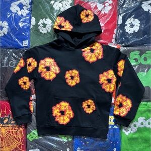 Denim Tears Women Black Hoodie with Vibrant Floral Patterns